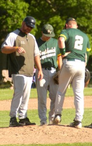 Southwick-Tolland Regional High School baseball coach Tim Karetka takes a trip to the mound to attempt to rally the troops in Monday's Western Massachusetts Division 3 quarterfinal game against visiting Greenfield. (Photo by Chris Putz)