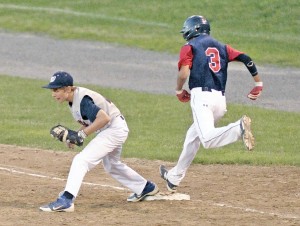 Westfield first baseman Mike Nihill, left, makes the out on Pittsfield's Ian Benoit during Friday night's Western Massachusetts 13-Year-Old Babe Ruth state tournament game. (Photo by Frederick Gore/www.thewestfieldnews.smugmug.com)