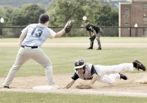 Westfield's Carter Cousins, right, slides safely under the tag of Portland, Maine's Nick Boyle during Tuesday's game at Newtown, Connecticut. Maine won 5-0 in extra innings. (Photo by Frederick Gore)