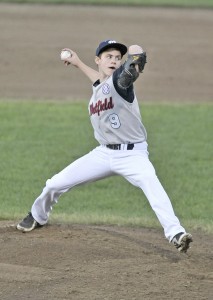 Westfield pitcher Spencer Cloutier delivers in the first inning of last night's Western Massachusetts 13-Year-Old Babe Ruth state tournament game under the lights of Bullens Field. (Photo by Frederick Gore/www.thewestfieldnews.smugmug.com)