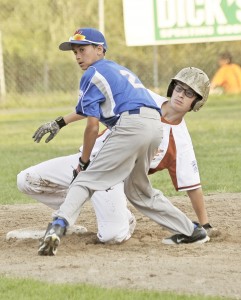 Westfield American Tony Torres, foreground, looks for the call after an Agawam baserunner slides to second during yesterday's Little League game. (Photo by Frederick Gore/www.thewestfieldnews.smugmug.com)
