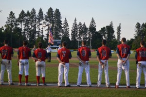 Westfield Post 124 stands at attention as members of American Legion Post 124 present the colors as part of a special pre-game ceremony at Bullens Field last night. (Photo by Robby Veronesi)