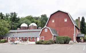 This past spring The Westfield River Brewing Company began growing its own hops on land behind the property which is leased to them from John Whalley at their new location at 707 College Highway. The well-known former Chuck's Steak House closed many years ago and was most recently home to the Southwick Feed Warehouse. ( Photo by Frederick Gore)