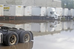 Drivers attempting to load and unload their trailers at this company on South Broad Street in Westfield were tasked with trying to stay out of the water in this parking lot after yesterday's rain. (Photo by Frederick Gore)