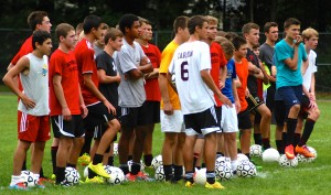 Players for the Westfield High School boys' soccer team listen to instructs from head coach Andrew Joseph during a practice session Friday at Westfield Middle School North. (Photo by Chris Putz)