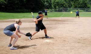 The city's police and fire departments gathered Saturday at Whitney Field for a softball tournament and cookout for fun and camaraderie. (Photo by Douglas LaValley) 