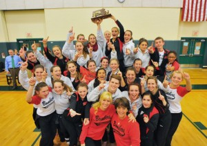 New Westfield gymnastics coach Bethany Liquori (bottom left) and former head coach Joanne Hewins (bottom right), pose for a photo with the Westfield team following the Bombers seventh consecutive sectional title last season. (File photo/Fred Gore)