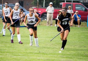 Westfield senior Desiree Otero marks up on sophomore Claire Fitzpatrick of Longmeadow. (Photo by: Liam Sheehan)