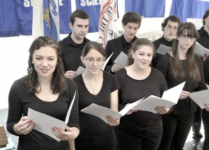 Members of the Westfield State University Chamber Chorale perform the schools Alma Mater during a ground breaking ceremony for a new science building. (Photo by Frederick Gore)