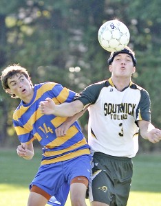 Southwick's Austin Leary, right, battles Andrew Mercer during Friday's match at the Southwick Recreation Center. (Photo by FRederick Gore)