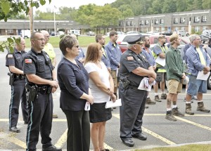 Members of the Southwick Police Department and the Department of Public Works join the public in a 9/11 Remembrance Ceremony at the Southwick Fire Department yesterday. (Photo by Frederick Gore)