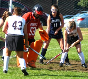 Westfield goalie Karly Mastello (53) and the Bombers' defense protect their goal. (Photo by Chris Putz)