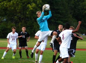 Amherst's goalkeeper keeps the ball away from the Westfield offense Thursday. (Photo by Chris Putz)
