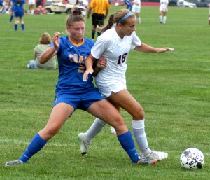 Westfield's Karly Diltz, right, gains position against Chicopee Comp's Natalie Galindo, left. (Photo by Chris Putz)