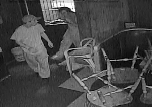 A thin young man who was able to break in the City Hotel bar early Sunday morning via a small window is seen letting a confederate into the bar by the back door. Anyone who may be able to identify either man is asked to call city detectives at 572 6400.