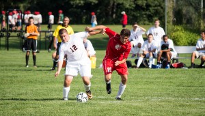 Westfield senior Tim Fratini makes a play for the ball in Tuesday's opening game against East Longmeadow. (Photo by Liam Sheehan)