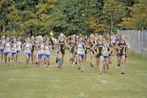 Members of the Gateway Girls Cross Country team running in a race in Southwick during the 2014 season. (WNG File Photo)