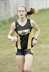 Southwick's Emily McKinney finished first for the Southwick team with a time of 22:13 and second overall to Gateway's Fay Grzybowski time of 21:54 Wednesday. (Photo by Frederick Gore)