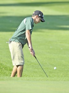 St. Mary High School's No. 2 player Dominic Ceccarini chips to green during Monday's match against Voc-Tech. (Photo by Frederick Gore)