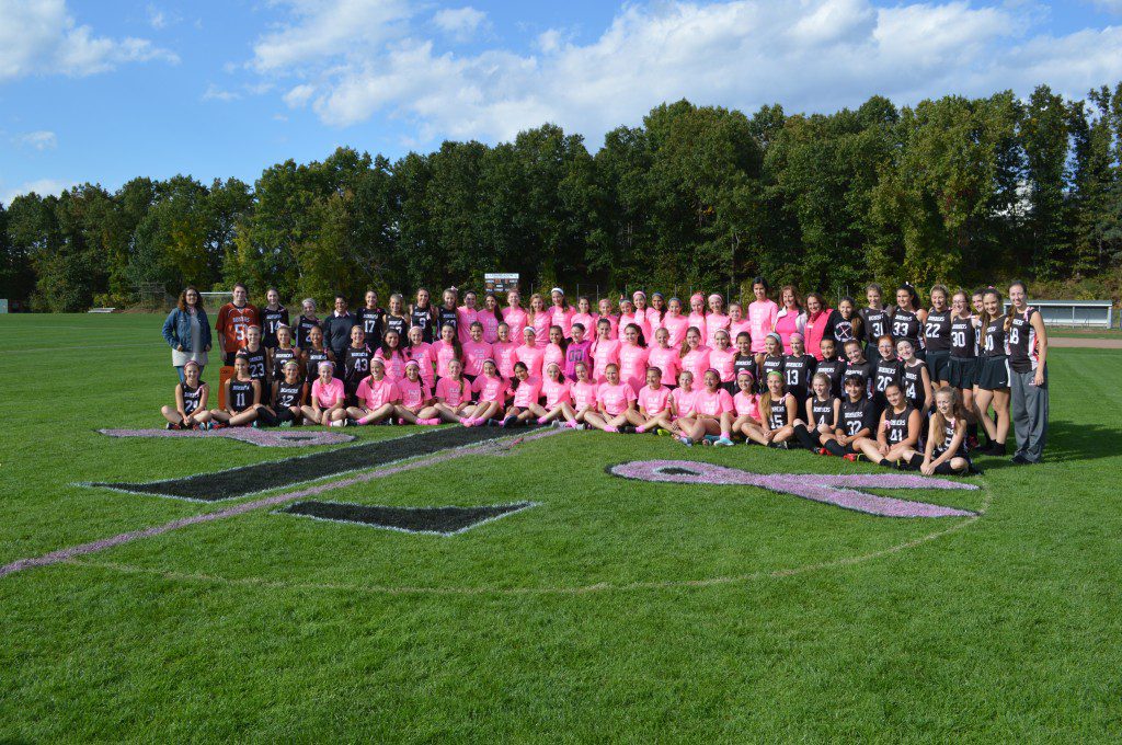 The Westfield and Longmeadow field hockey teams, pictured above during a recent charitable game, Play4theCure, raised nearly $1,000 to benefit the National Foundation for Cancer Research, Rays of Hope, and NFCR. (Submitted photo)