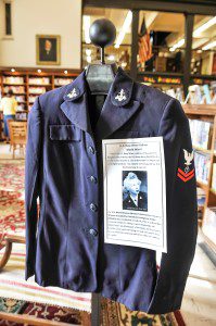A U.S. Navy WAVE uniform worn by Maryann Ochs Douglas is presently on display at the Westfield Athenaeum as part of a Veterans Day remembrance display. Douglas served in the U.S. Navy during World War II as a Link Trainer instructor training pilots before being transferred to the war front. A wide variety of military uniforms are presently on display throughout the Athenaeum. (Photo by Frederick Gore)