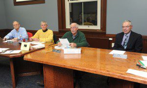 Conservation Commission members (from left) Thomas E. Sharp. James Murphy, Chairman David A. Doe and Henry Bannish listen to a resident during the public participation portion of their meeting Tuesday night. (Photo by Carl E. Hartdegen)
