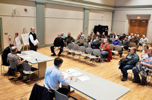 Southwick Department of Public Works Director Randal Brown, standing left, addresses audience members who attended an informational public hearing on the Congamond Road Reconstruction Project Wednesday evening at the Southwick Town Hall. (Photo by Frederick Gore) 