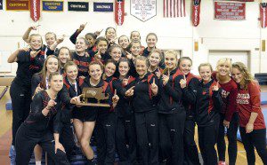 Members of the Westfield High School Gymnastics Team pose for a team photo after winning the 2014 Gymnastics West Sectional Tournament Friday night. Competing for the title were Agawam, Chicopee Comprehensive, Hampshire Regional and Minnechaug Regional High School. (Photo by Frederick Gore)
