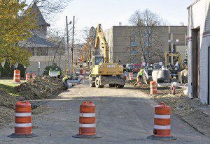 Construction workers participate in road repairs in Westfield (WNG file photo)