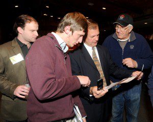 Dan Allie (second from right) reviews the numbers with supporters Peter Fedora, Mark Butler and Vincent Barre as he watches the returns with supporters at East Mountain Country Club. (Photo by Carl E. Hartdegen)