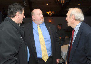 Don Humason chats with supporters Themis Rizos of Southampton and George Bitzas of Agawam at his victory party Tuesday evening at East Mountain Country Club. (Photo by Carl E. Hartdegen)