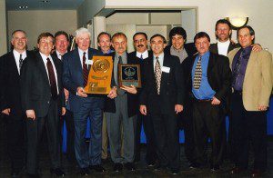 Reunion of the 1974 Westfield Men's Soccer Final Four Team - John Kurty, fourth from left with trophy. (Photo courtesy of Westfield State Sports)