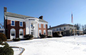 Because of the expected cold temperatures and snow during the calling hours at Firtion Adams Funeral Home today, arrangements have been made to allow attendees to wait at the Masonic Temple before moving on to the funeral home. (Photo by Carl E. Hartdegen)
