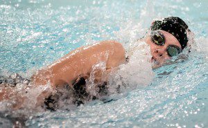 Westfield High School senior captain Lauren Longley competes in the Girls' 200-Yard Freestyle during yesterday's match against visiting Minnechaug. (Photo by Frederick Gore)