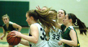 St. Mary's attempts to chase down the ball against Ware in Tuesday night's Division 3 tournament opener in girls' high school basketball. (Photo by Chris Putz)