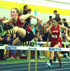 Westfield's Morgan Sanders leads the pack in the 55 meter hurdles Friday night at Smith College in Northampton. (Photo by Chris Putz)