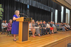 Cynthia Neary, president of CSF Westfield Dollars for Scholars of Westfield, introduces members of the Board of Directors and Officers, during a scholarship presentation at Westfield Middle School South in 2013. (File photo by Frederick Gore)