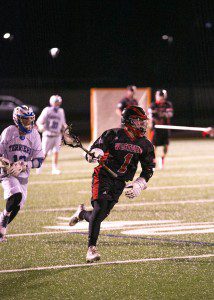 Patrick Liptak sprints downfield and looks for an open Westfield attack against West Springfield on Tuesday night. (Photo by Liam Sheehan)