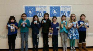 Westfield Girl Scout Troop 41059 display puzzle piece pins they made to recognize World Autism Awareness Day April 2. (Photo by Sarah Timmerman) 