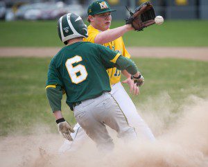 Andrew Mitchell (6) of Southwick-Tolland Regional High School safely makes it home as the throw is a tad late to St. Mary's pitcher Jacob Butler. (Photo by Liam Sheehan)