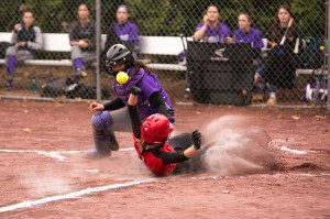 Westfield senior Hannah Giffune slides under an empty tag to score Westfield's first run of the game on Tuesday. (Photo by Liam Sheehan)