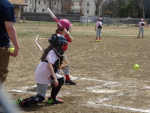 In this game featuring Dunkin Donuts and the Westfield Police Little League teams, Allie Stucenski gets into position to catch the ball. (Submitted photo)