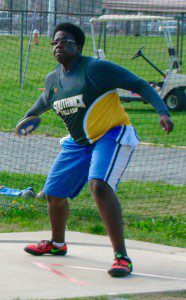Rams' Dermotheo Walden participates in the discus event. (Photo by Chris Putz)