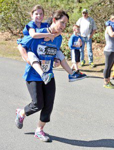 Not everyone crossed the finish line under their own power during the 31st Annual 5K Run / Walk for a Noble Cause, Saturday at Stanley Park. (Photo by Frederick Gore)