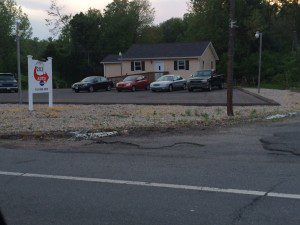 202 Auto on College Highway was approved this week to sell nicotine delivery systems in addition to used cars. (Photo by Hope E. Tremblay)
