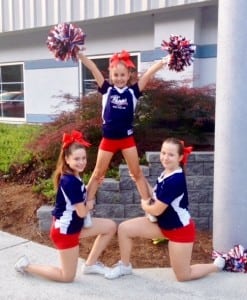 From left to right, are local "Patriots" and youth cheerleaders Paige Sanders, Tori Szczepanek and Melanie Burek. (Submitted photo)