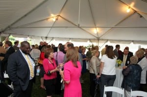 Attendees of the Baystate Noble merger announcement mingle with each other after the formal ceremonies concluded.