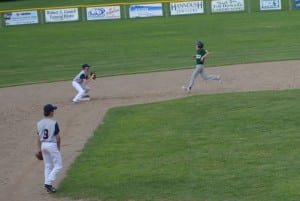 Wyatt Bandy-Page (green) is forced out at second base after Matt Pelletier (9) fielded a grounder and threw to Jack Masciadrelli at second base. The Westfield defense allowed one hit to Franklin County and allowed no balls to land safely in the outfield.