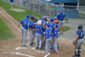 David Tirell (9, middle) led the Westfield American offense with a pair of home runs in the first inning, half of the Westfield home run total. Tirell finished the night with five runs batted in, three hits and four runs scored.