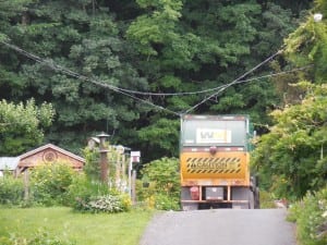 A Waste Management truck snagged some wires on a routine pickup at 25 Russell Road in Huntington.